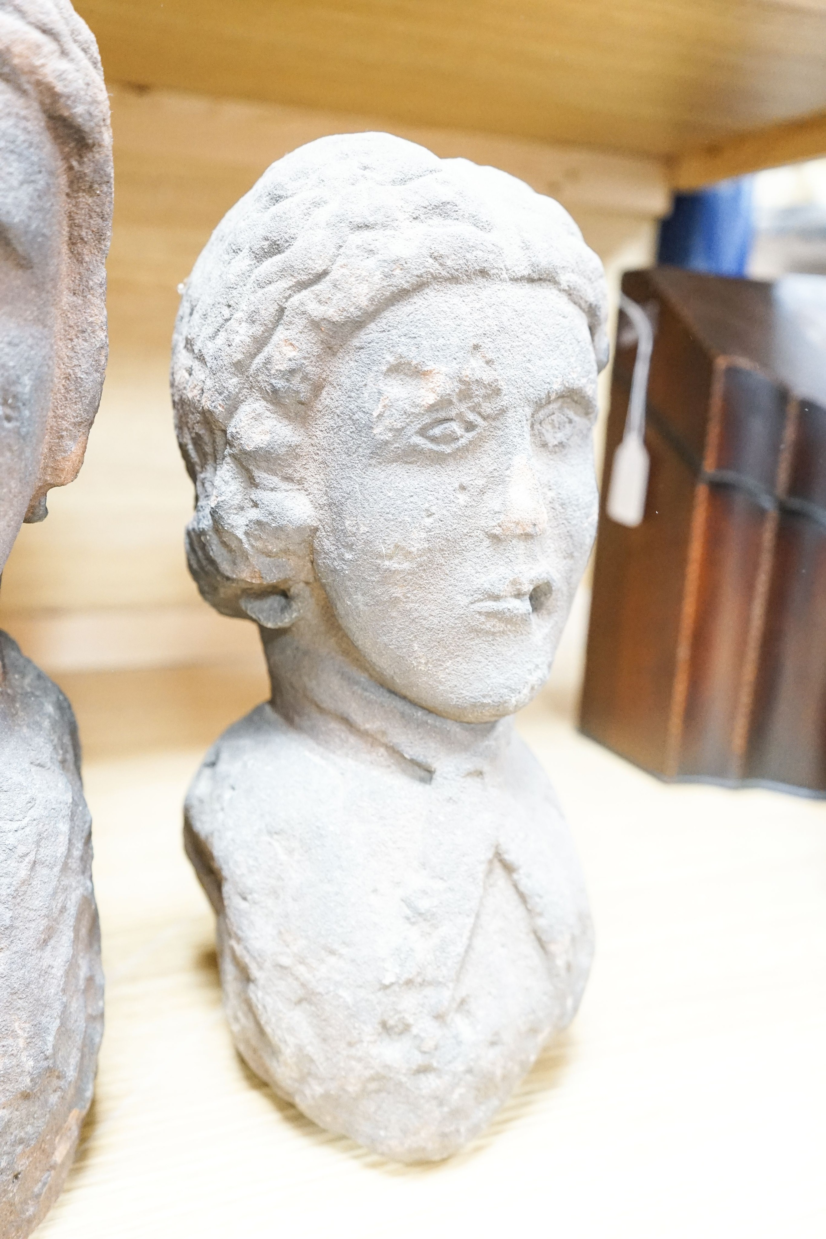 Three red sandstone busts of two ladies and a gentleman, 41cm